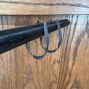 Black earrings. Made of black metal.